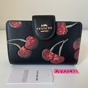 Coach medium corner zip with cherry print🎈🎈